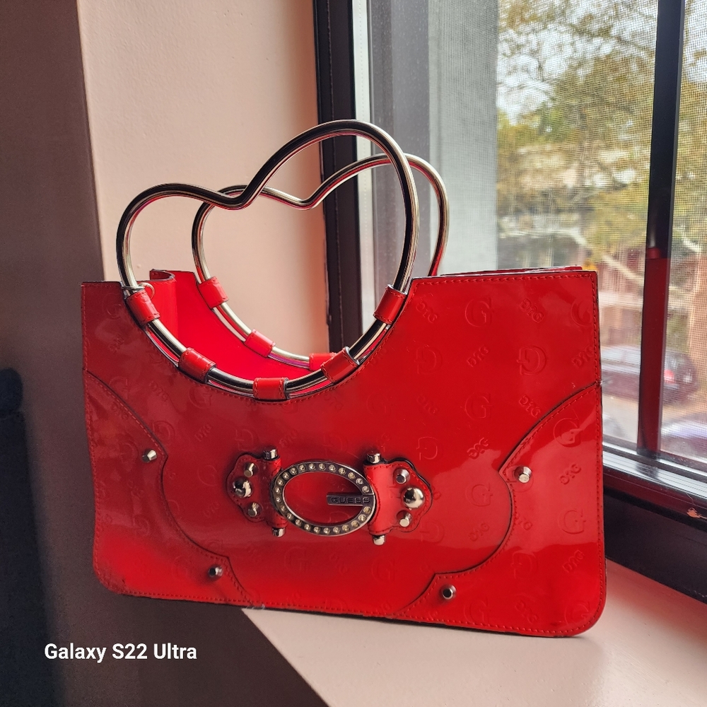 Bright red patent leather Guess handbag heart shaped handle